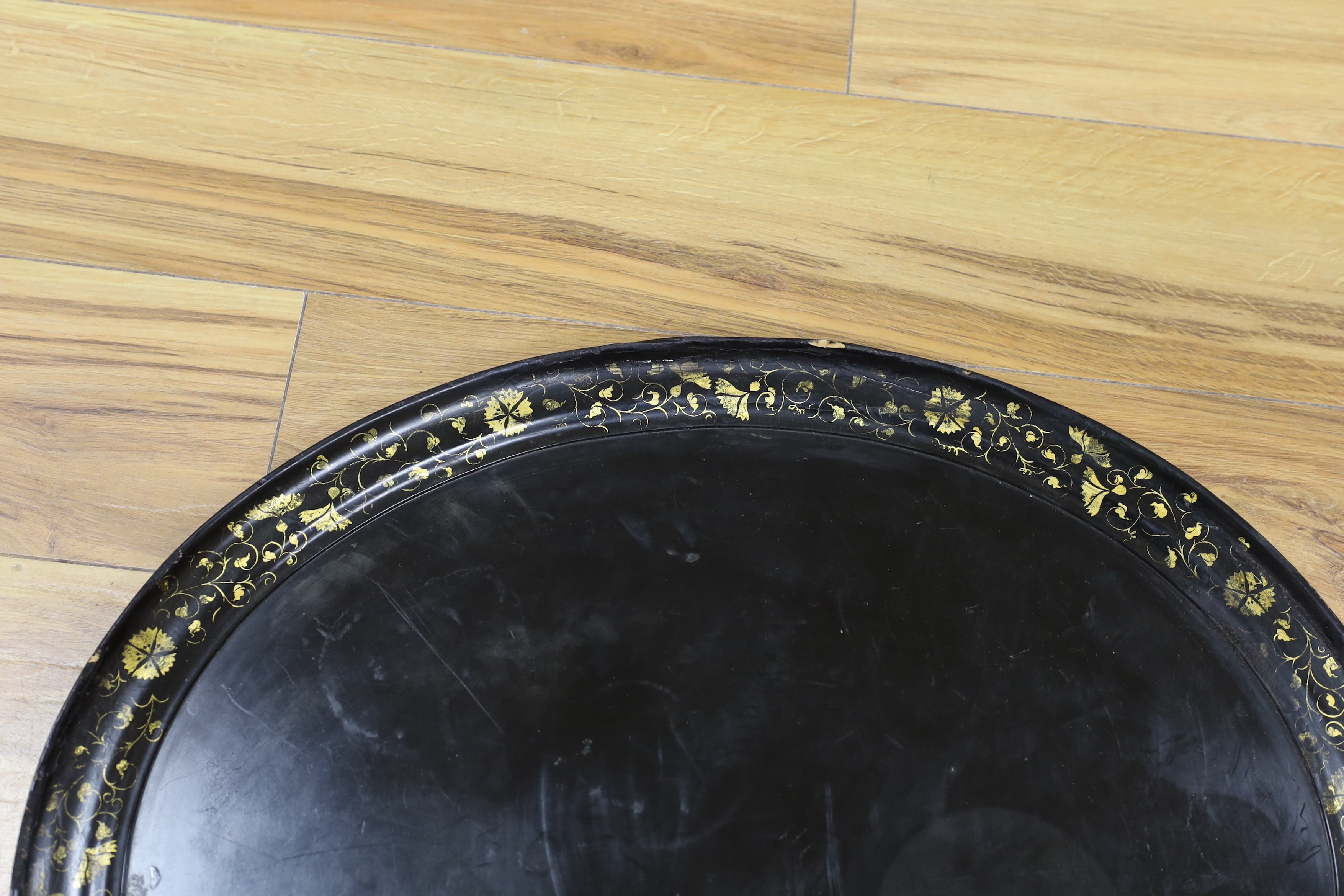 A Victorian paper mache tray with gilt decorated border, 51 x 63cm